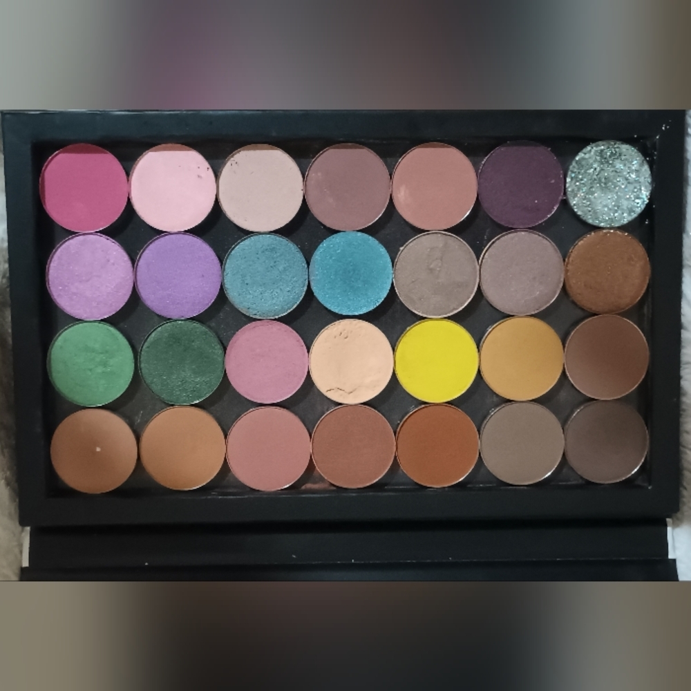 Karity magnetic palette with ColourPop and Karity shades.